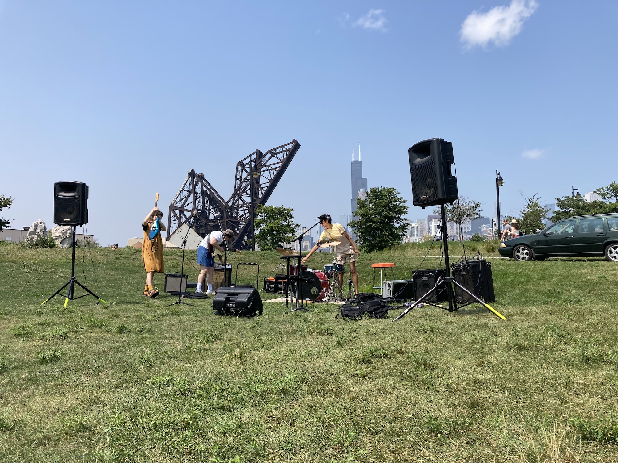 Hard Femme setting up the gear. Remember that half of playing music is carrying heavy stuff.